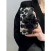 Floral Elegance Phone Case with Black Mesh Flower Strap